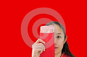 Unhappy Chiense woman red envelop with money New Year