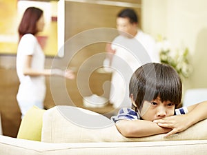 Unhappy child and quarreling parents