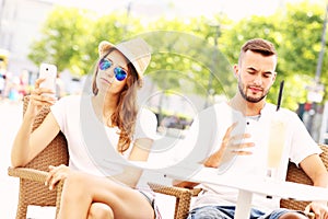 Unhappy couple in a cafe