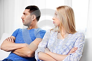 Unhappy couple having argument at home