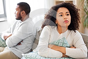 Unhappy couple having argument at home