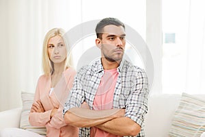 Unhappy couple having argument at home