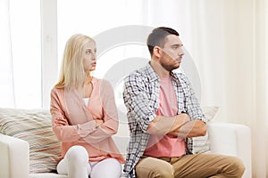 Unhappy couple having argument at home