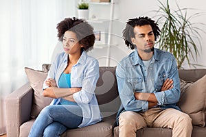 Unhappy couple having argument at home