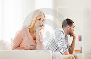 Unhappy couple having argument at home photo