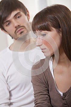 Unhappy couple at home