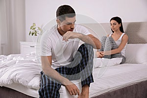 Unhappy couple with relationship problems after quarrel