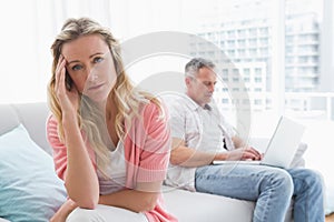 Unhappy couple are stern and having troubles photo