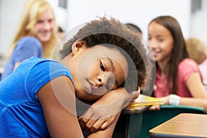 Unhappy Girl Being Bullied In Class