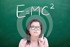 Unhappy girl with e=mc2