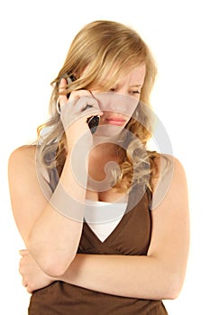 Unhappy girl phoning