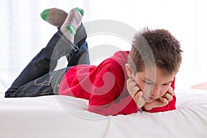 Unhappy Kid Looking Down