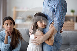 Unhappy little child hug leaving parent say goodbye