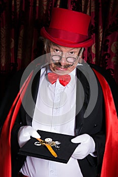 Unhappy magician with broken watch