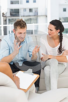 Unhappy man talking at couples therapy session