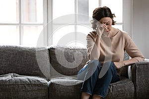 Unhappy mature woman feel anxious lost in thoughts