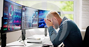 Unhappy Overwhelmed Business Man Looking At Dashboard