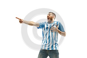 The unhappy and sad Argentinean fan on white background