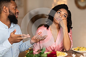 Unhappy Sad Black Couple Arguing During Dinner