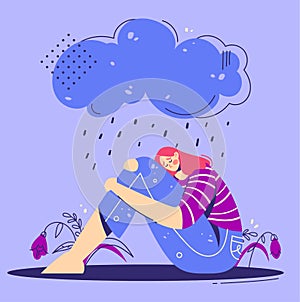 Unhappy, sad depressed young woman hugs legs under rainy cloud. Teenage girl are sitting under rain. Depression concept.