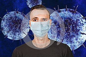 Unhappy, sad young man wearing a protective face mask prevent virus infection or pollution