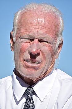 Unhappy Senior Businessman Wearing Tie Isolated