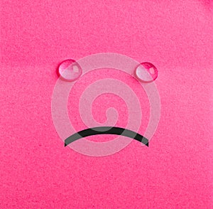 Unhappy sticky note. Pink paper