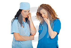 Unhappy two doctors women