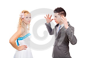 Unhappy wedding couple arguing