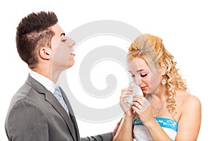 Unhappy wedding couple crying