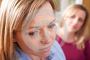 Unhappy Woman In Conversation With Friend Or Counsellor