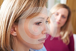 Unhappy Woman In Conversation With Friend Or Counsellor