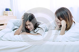 Unhappy woman crying because gets broken heart, disappoint or lose her job and her best friend get shocked when receive photo
