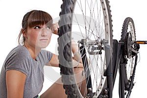 Unhappy woman with defect bike photo