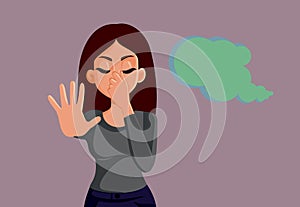 Unhappy Woman Making Stop Gesture Sensing Bad Odor Vector Illustration photo