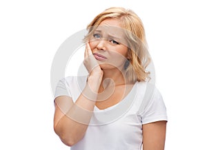 Unhappy woman suffering toothache