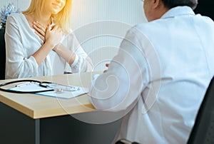 Unhappy woman talking problems to doctor psychiatrist in hospital,Discuss issue and find solutions to,Mental health concept