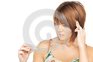 Unhappy woman with thermometer