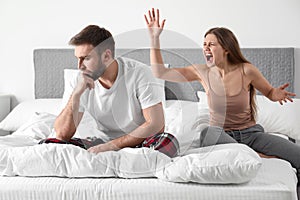 Unhappy young couple quarreling. Relationship problems