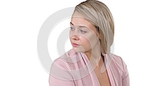 Unhappy young girl waiting for phone ring despairingly on white background.