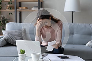 Unhappy young woman feeling stressed of lack of money.