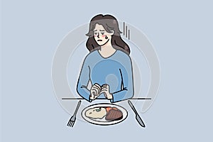 Unhappy woman sit with dish plate suffer from eating disorder