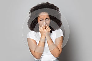 Unhealthy biracial woman feel unwell having fever