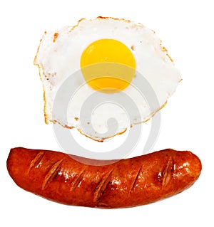 Unhealthy grilled barbecue sausage and egg