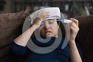 Unhealthy Indian female suffer from influenza at home