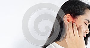 Unhealthy lady suffering from strong earache, head shot portrait. Stressed frowning young ethnic girl plugging ear