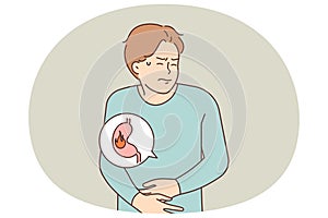 Unhealthy man suffer from stomach inflammation