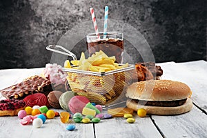 Unhealthy products. food bad for figure, skin, heart and teeth.