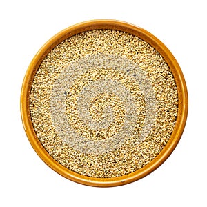 Unhulled foxtail millet seeds in round bowl cutout photo