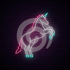 Unicorn neon sign. Magical unicorn standing on hind hooves.